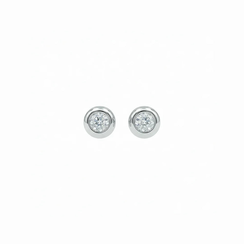 Aretes de diamantes en oro blanco 18K