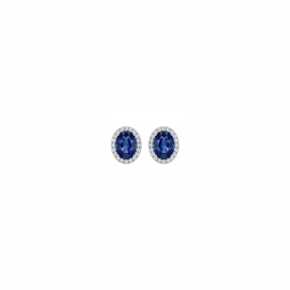 Aretes de cianita azul y diamantes en oro blanco 18K