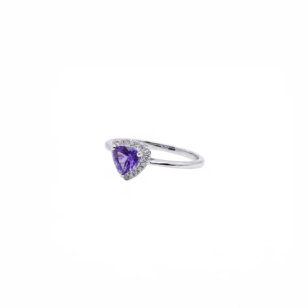 Anillo de tanzanita violeta azulado en oro blanco 18K