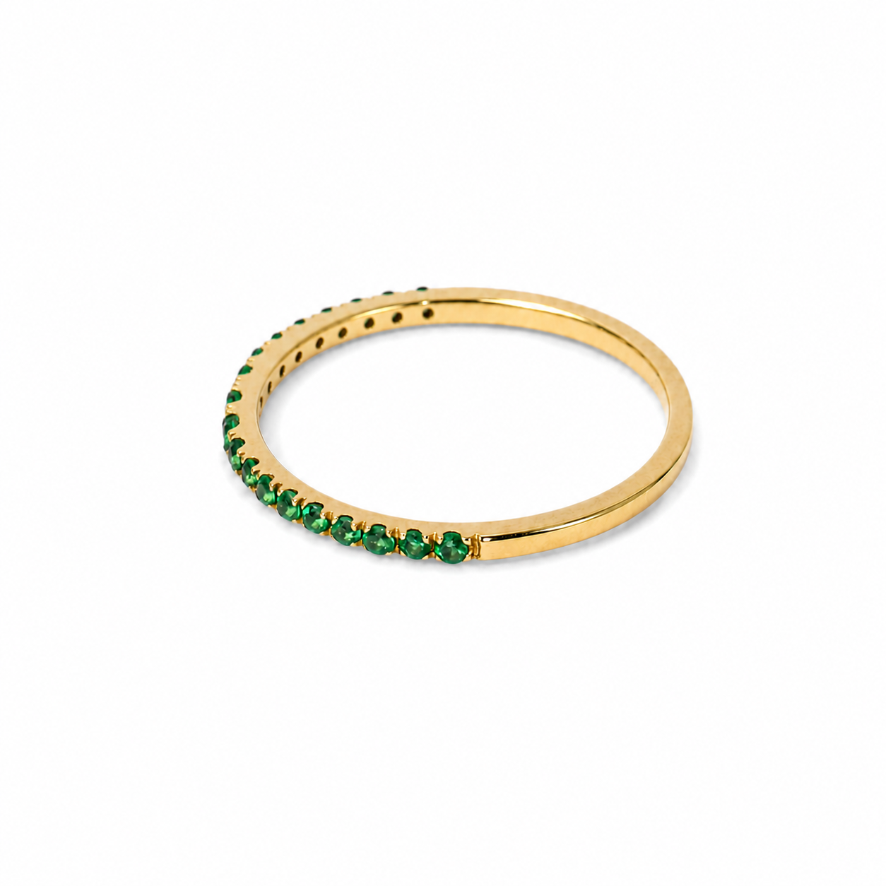 Anillo medio riviere de esmeraldas en oro amarillo 18K