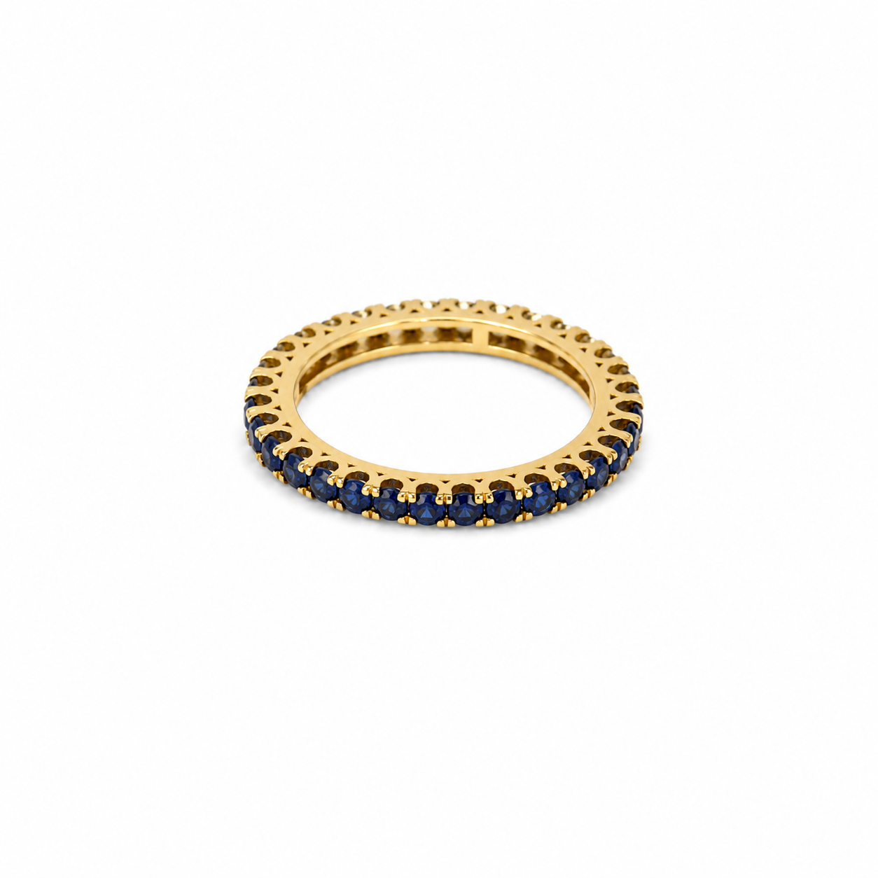 Anillo de zafiros azules y diamantes en oro amarillo 18K