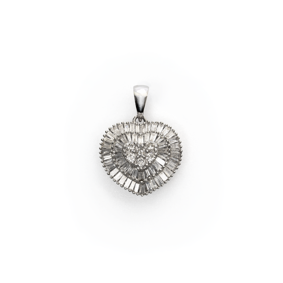Dije de diamantes en oro blanco 18K