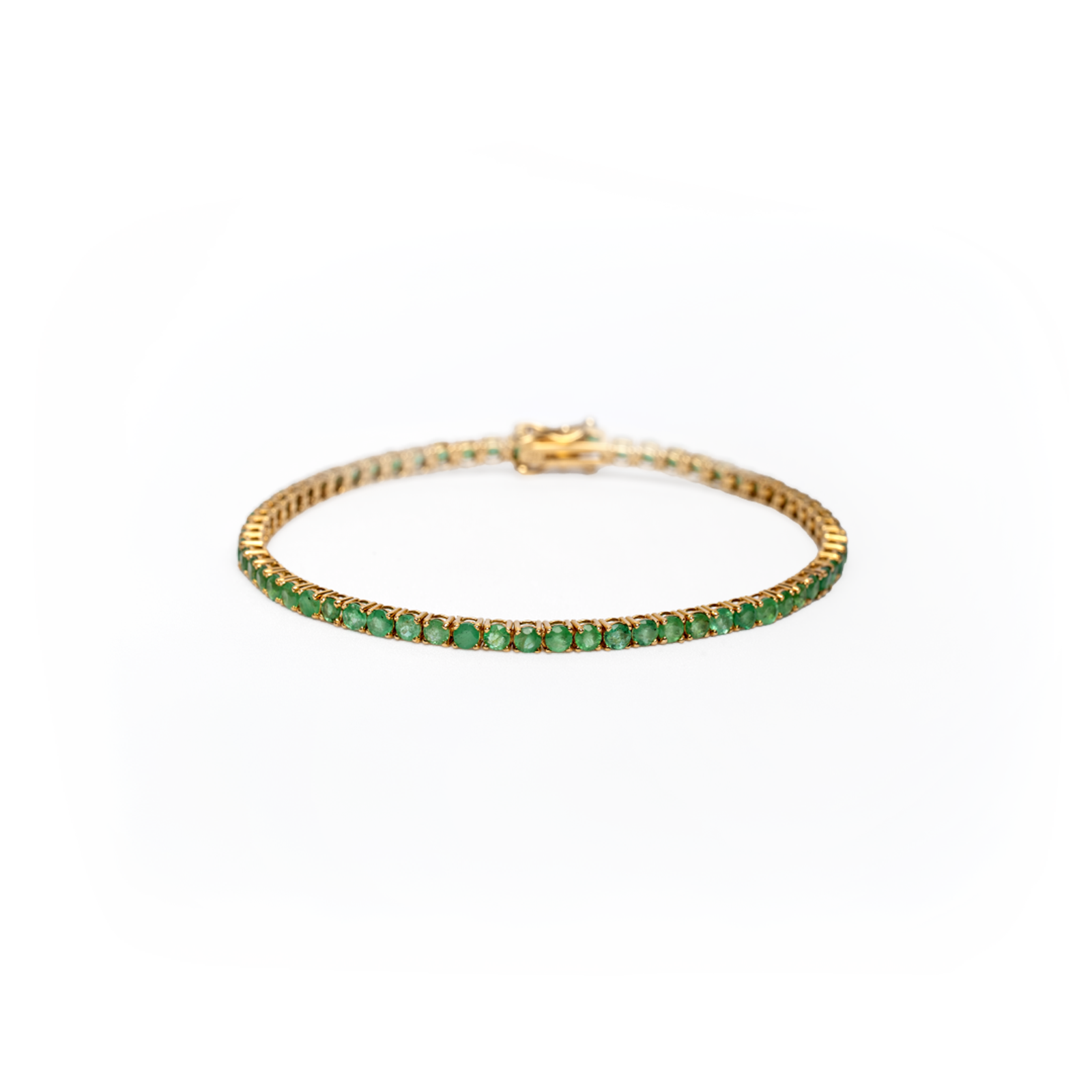 Tennis de esmeraldas en oro amarillo 18K