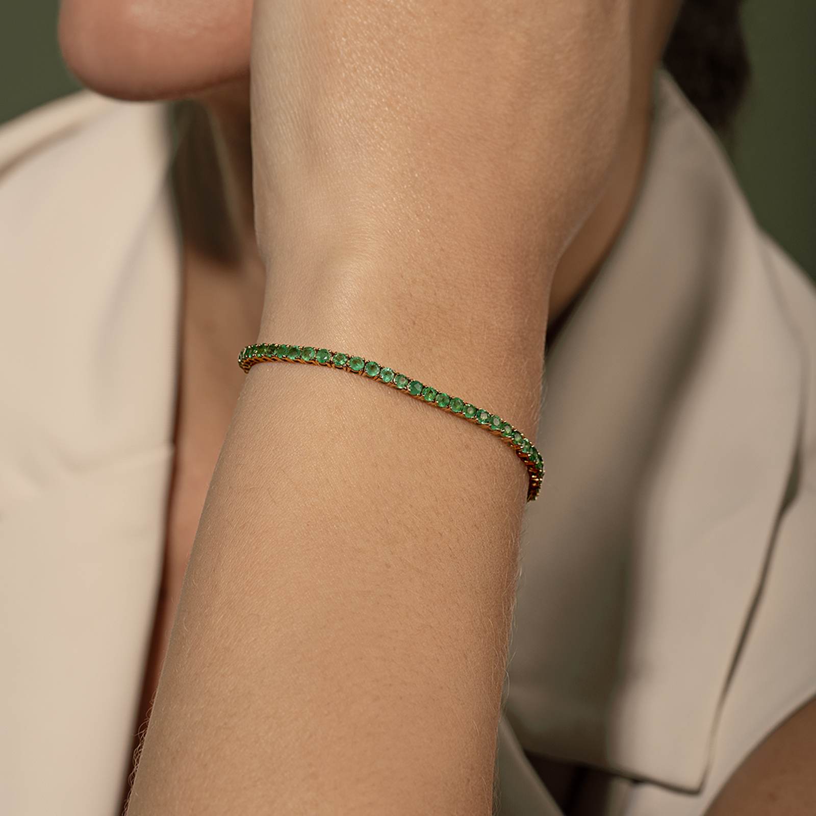 Tennis de esmeraldas en oro amarillo 18K