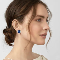 Aretes de cianita azul y diamantes en oro blanco 18K