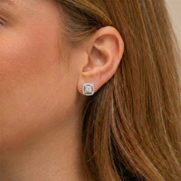 Aretes de diamantes en oro blanco 18K