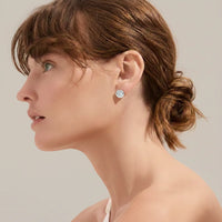 Aretes de diamantes en oro blanco 18K