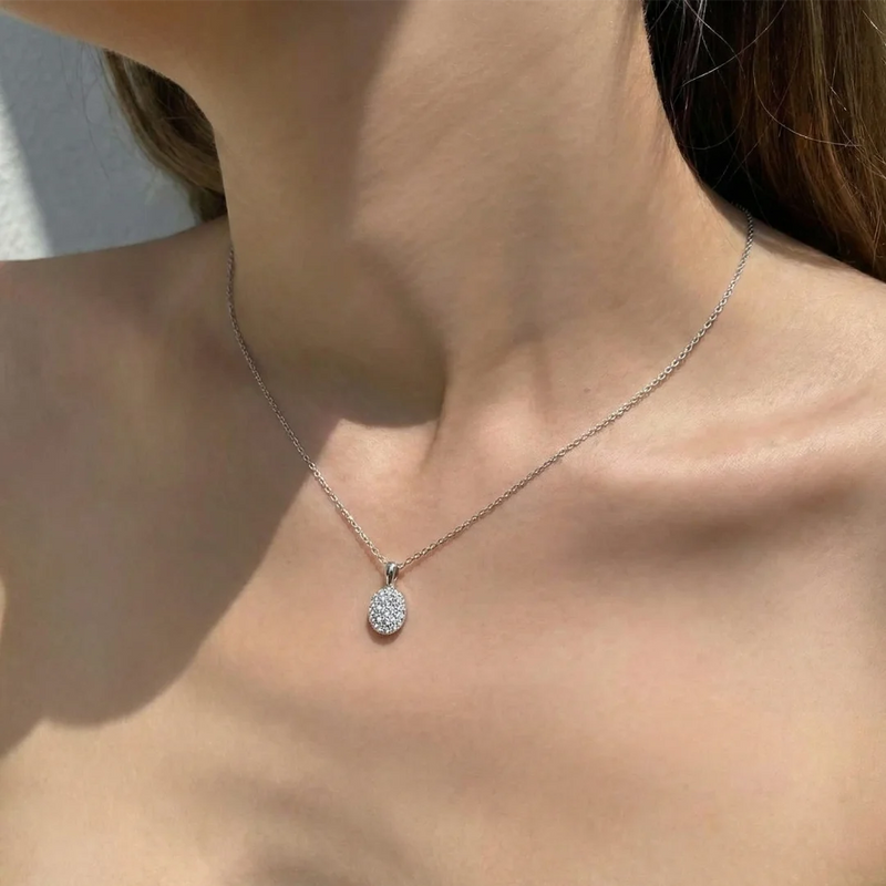 Dije de diamantes en oro blanco 18K