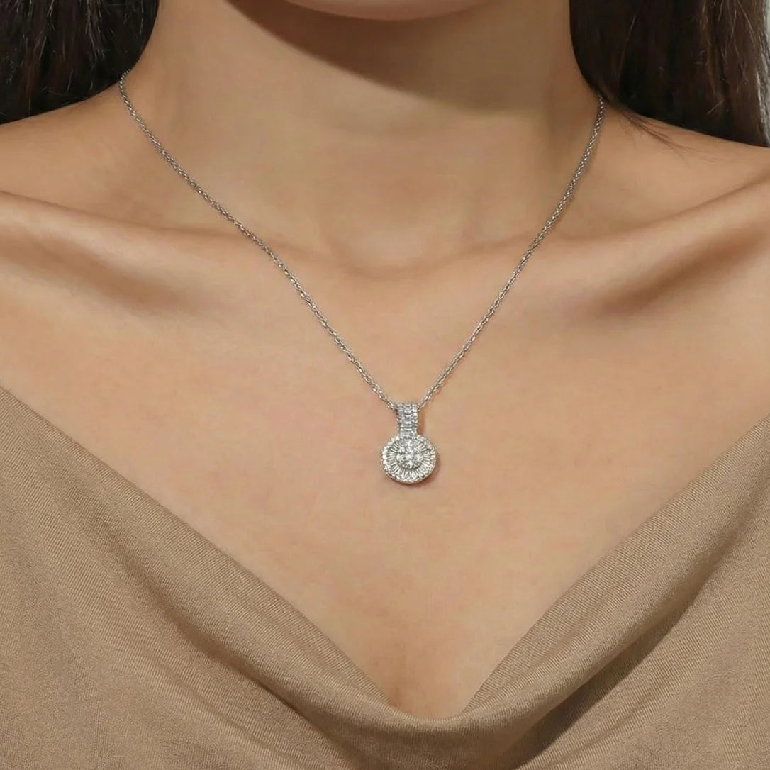 Dije de diamantes en oro blanco 18K