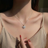 Dije de diamantes en oro blanco 18K