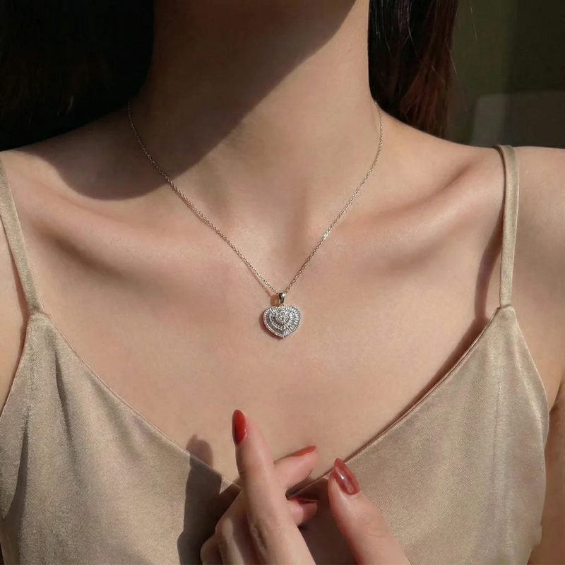 Dije de diamantes en oro blanco 18K