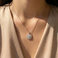 Dije de diamantes en oro blanco 18K